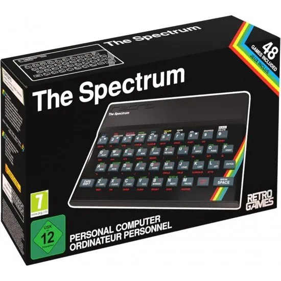 The Spectrum Personal Computer ZX Spectrum Replica Retro Games The Spectrum Personal Computer replica device with its authentic keyboard and a screenshot of a classic ZX Spectrum game