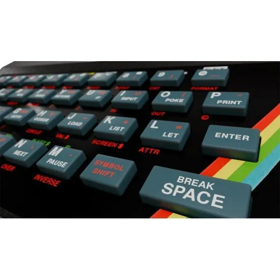 The Spectrum Personal Computer ZX Spectrum Replica Retro Games The Spectrum Personal Computer replica device with its authentic keyboard and a screenshot of a classic ZX Spectrum game