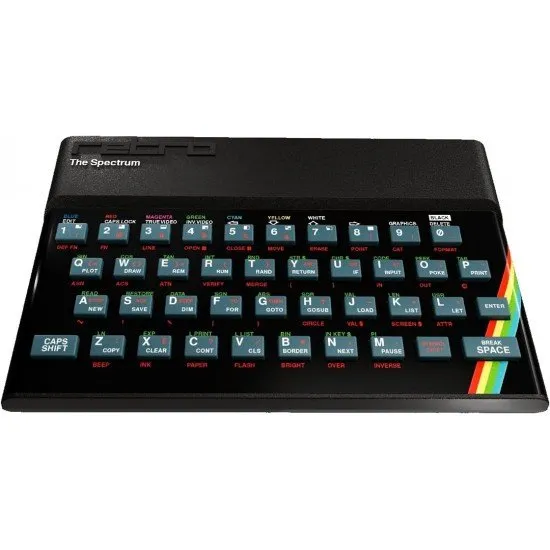 The Spectrum Personal Computer ZX Spectrum Replica Retro Games The Spectrum Personal Computer replica device with its authentic keyboard and a screenshot of a classic ZX Spectrum game