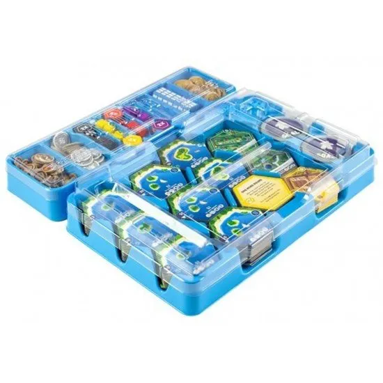 Suburbia 2nd Edition board game box showing the modern artwork and hex-shaped city tiles