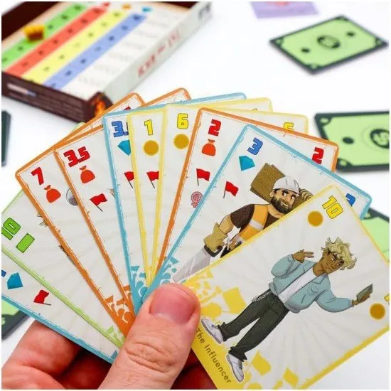 Tax the Rich trick-taking card game box featuring social class character artwork