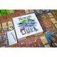 Two player boards representing rescue boats being filled with colourful cat-shaped tiles and treasures next to an island movement tracker