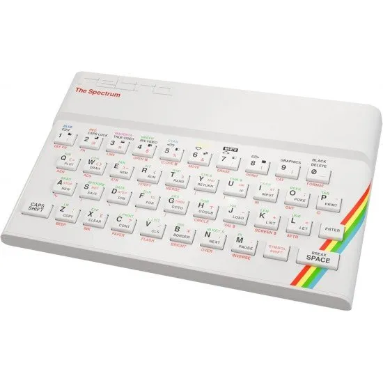 A white ZX Spectrum computer with a matching 8-button joystick and a CRASH magazine