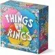 Things in Rings Board Game The box art for the Things in Rings board game, showing players gathered around a table with a triple Venn diagram and colorful object cards.