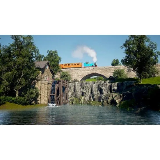 Thomas the Tank Engine pulling Annie and Clarabel past the iconic Tidmouth Sheds