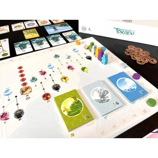 Tokaido Stonemaier Games Worker Placement Board Game Tokaido board game box art showing a traveler on the East Sea Road with a view of Mount Fuji and Japanese scenery