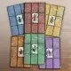 A pack of 6 dual-layered Vantage Player Mats from Stonemaier Games, designed to hold a 3x3 grid of cards and prevent them from shifting.