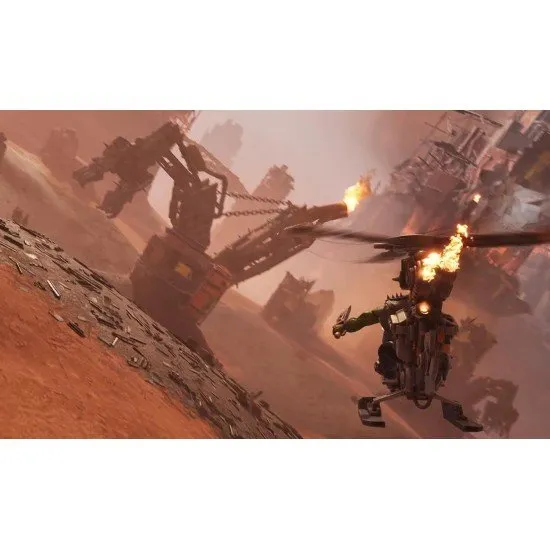 Orky buggies and tanks racing through a war-torn desert track with explosions in the background