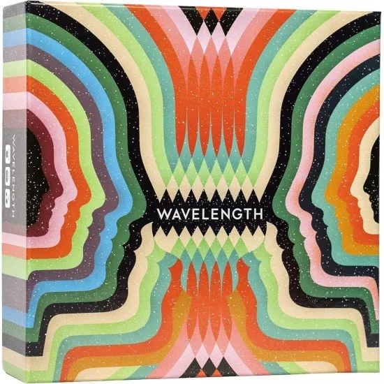 A large circular plastic dial with a sliding red screen and a pointer used for guessing spectrums