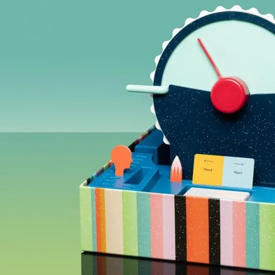 A large circular plastic dial with a sliding red screen and a pointer used for guessing spectrums