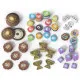 Wondrous Creatures Upgraded Components flat lay showing wooden egg tokens and metal trophy pieces replacing cardboard originals