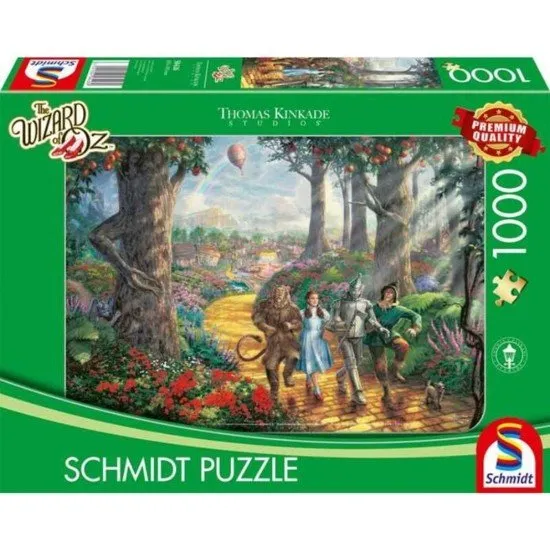 Thomas Kinkade The Wizard of Oz 1000 Piece Puzzle The box art for The Wizard of Oz 1000-piece puzzle by Thomas Kinkade, showing Dorothy, Toto, and her friends on the Yellow Brick Road leading to the Emerald City in Kinkade's luminous style.