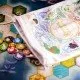 Wondrous Creatures board game box showing fantasy artwork, hexagonal puzzle board, and creature cards