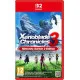 A Nintendo Switch 2 game case showing Noah and Mio standing on a grassy hill looking out at a massive, shattered sword piercing the landscape under an ultra-high-definition sky