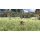 A Nintendo Switch 2 game case featuring Shulk standing on a lush green cliff holding the glowing red Monado sword, looking out at the colossal, distant frozen body of the Mechonis